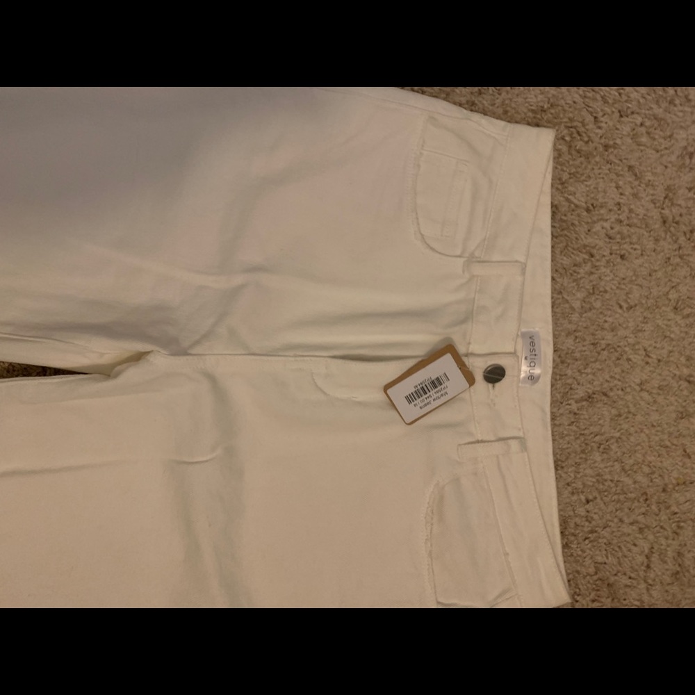 White ripped jeans